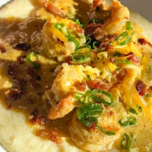close up of creamy shrimp on a bowl of grits