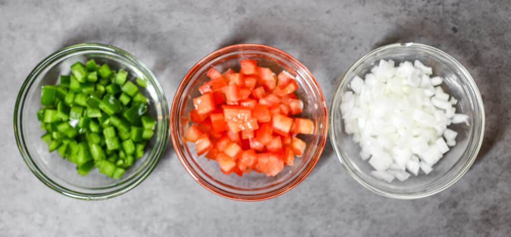 Pico de Gallo components. Jalapeno, tomato, onion