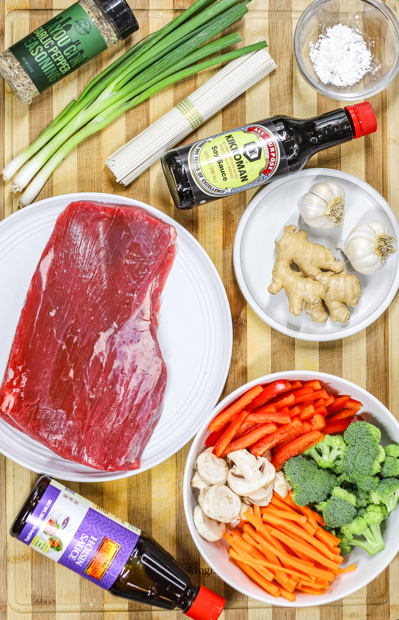 ingredients for this: veggies, soy sauce, sugar, flank steak, scallion, garlic pepper, ginger, garlic, and noodles