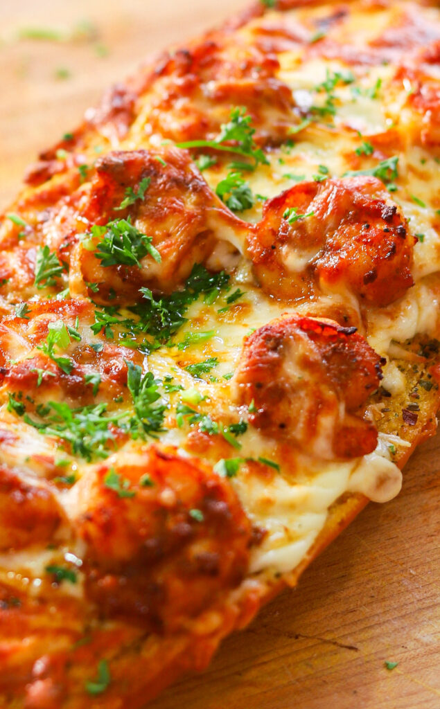 Crispy French bread topped with Cajun shrimp and cheese