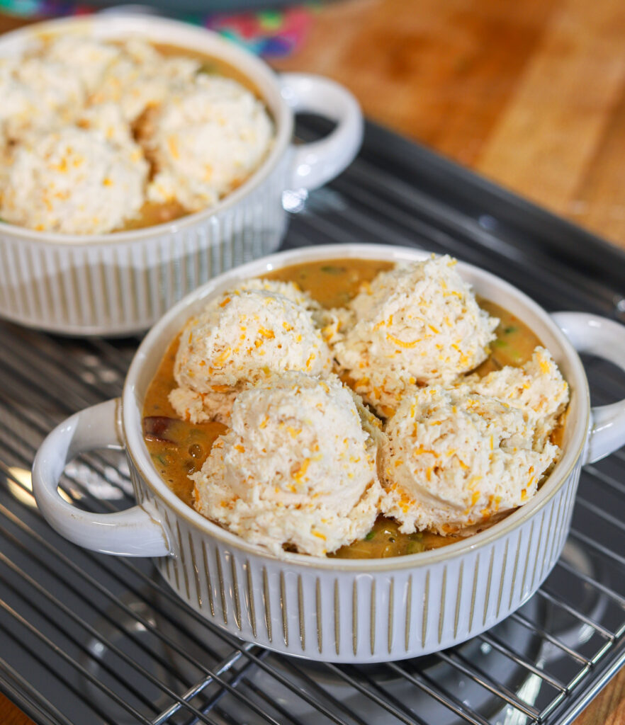 Cheddar biscuit dough topping individual seafood pot pies